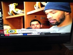 Green Bay Packers linebacker Julius Peppers and I along with other media members following their victory over Atlanta. 